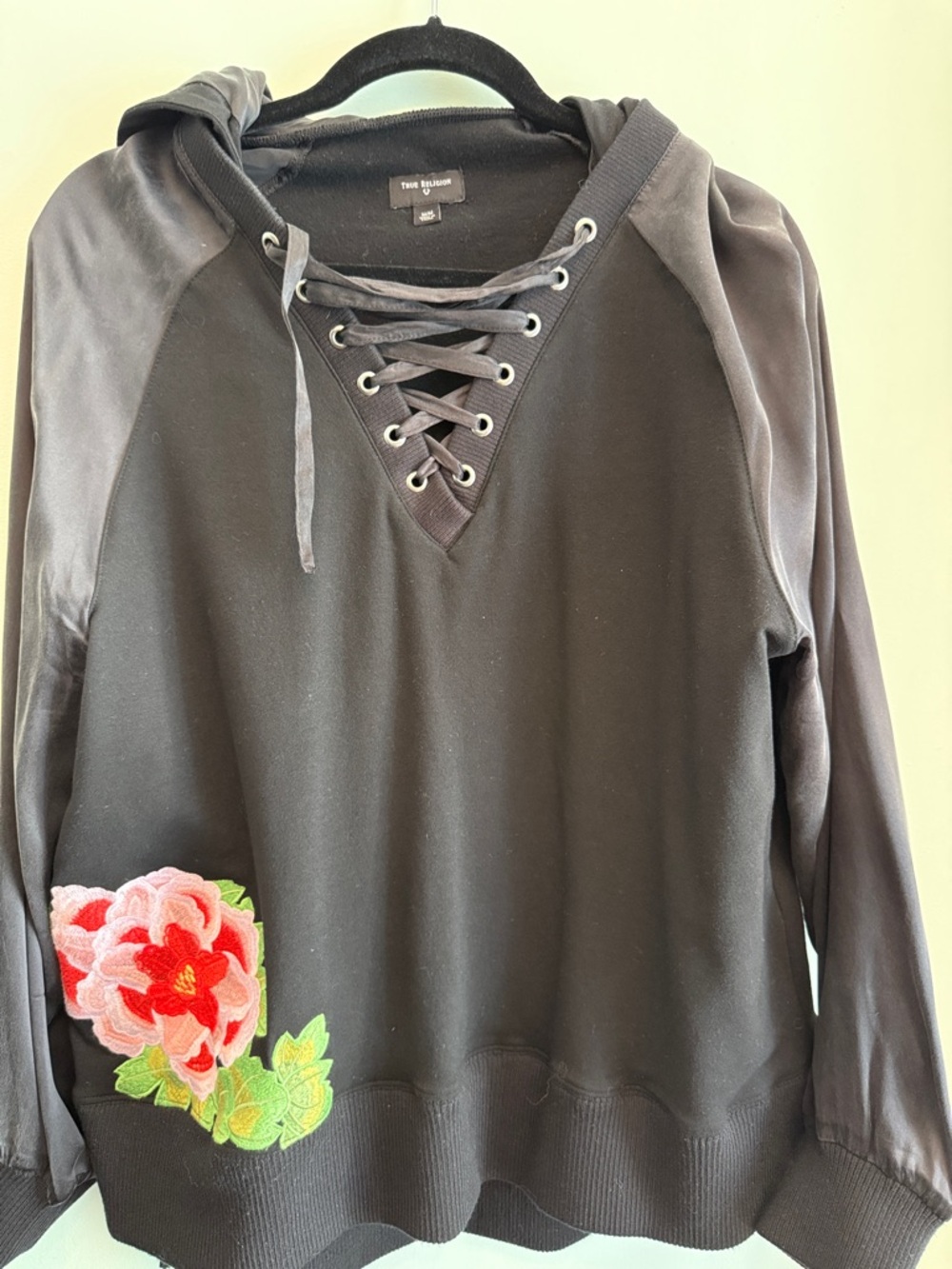 True Religion Black Lace-Up Hoodie with Floral Patch